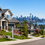 modern suburban houses in Washington with for sale sign and city skyline representing real estate market trends 2026